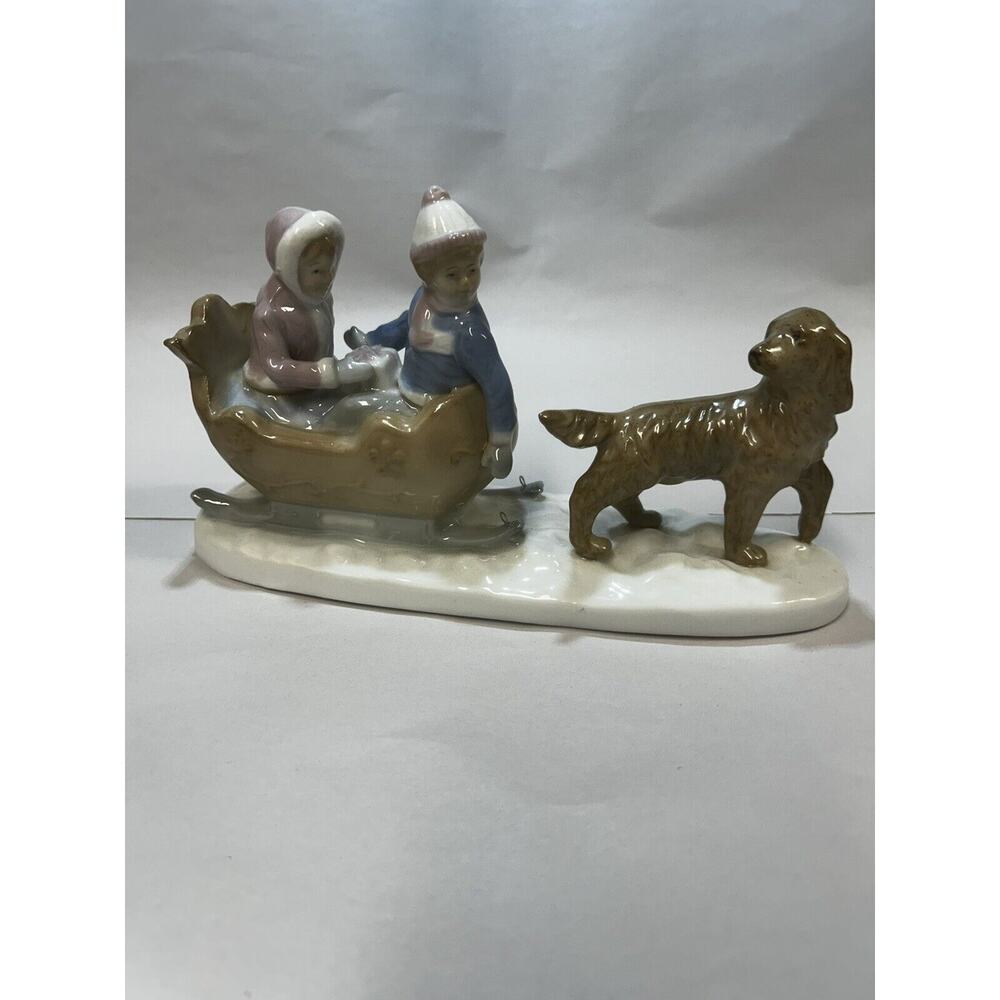 Paul Sebastian Porcelain Golden Retriever Pulling Children in Sled Figurine